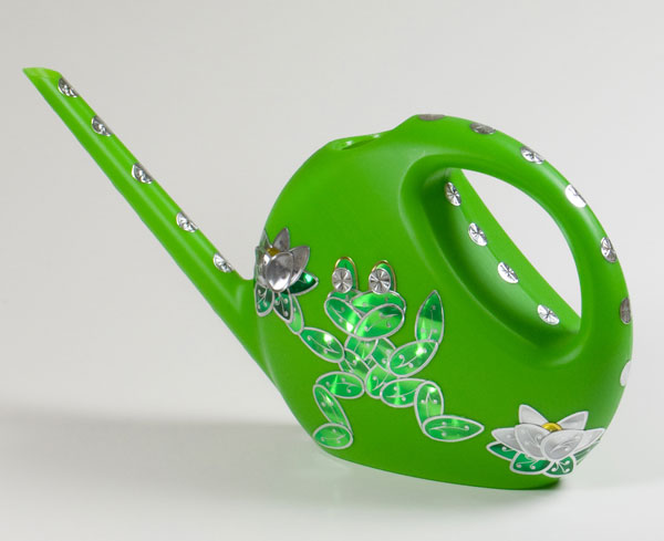 watering can with a frog